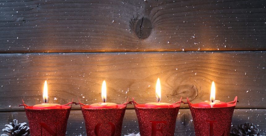 Wooden background with Christmas candles